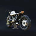 Vintage Metallic Silver Motorcycle Featuring Round Headlight Single Seat And Spoked Wheels