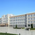 Modern School Building Exterior With Multi Story Design Spacious Courtyard And Green Trees
