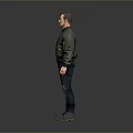 Man Standing in Green Bomber Jacket Blue Jeans and Boots on Gray Background