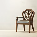 Classic Wooden Dining Chair With Ornate Carved Backrest Armrests And Gray Upholstered Seat