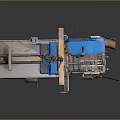 Industrial Processing Machine with Blue Cover White Body Conveyor Belt and Metal Frame