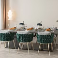 Modern Dining Table Set With Green Woven Chairs Tableware Wine Glasses And Pendant Light
