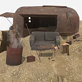 Rusted Trailer Abandoned Scene with Old Sofa Rusted Barrel And Debris On Sandy Ground