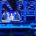 Futuristic Bar with Blue Lighting Dance Floor Bar Counter Mirrored Flooring and Arched Decorations