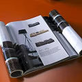 Open Magazines Scattered on Orange Background with Architectural Interior Design Content 3d model