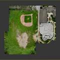 Aerial View Of Recreational Area With Baseball Field Green Grass Building And Swimming Pool