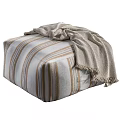 Cozy Striped Sofa Stool with Beige Brown Patterns and Fringed Blanket