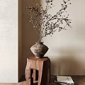 Rustic Ceramic Vase With Dry Branches On Wooden Stand Against Neutral Wall