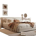 Beige Upholstered Double Bed With Pillows Blanket Bedside Table Lamp Decorative Paintings And Rug
