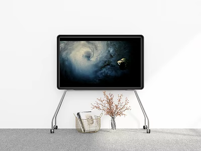 Screen On Metal Stand Displaying Whirlpool Image With Wicker Basket Dried Flowers Vase 3d model
