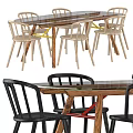 Modern Dining Table Set With Wooden Top Black Light Colored Chairs Red Yellow Accents