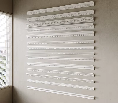 Display of Various Decorative Ceiling Moldings on Wall in Different Styles 3d model