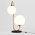 Modern Dining Table With Golden Stand And Two White Spherical Lampshades