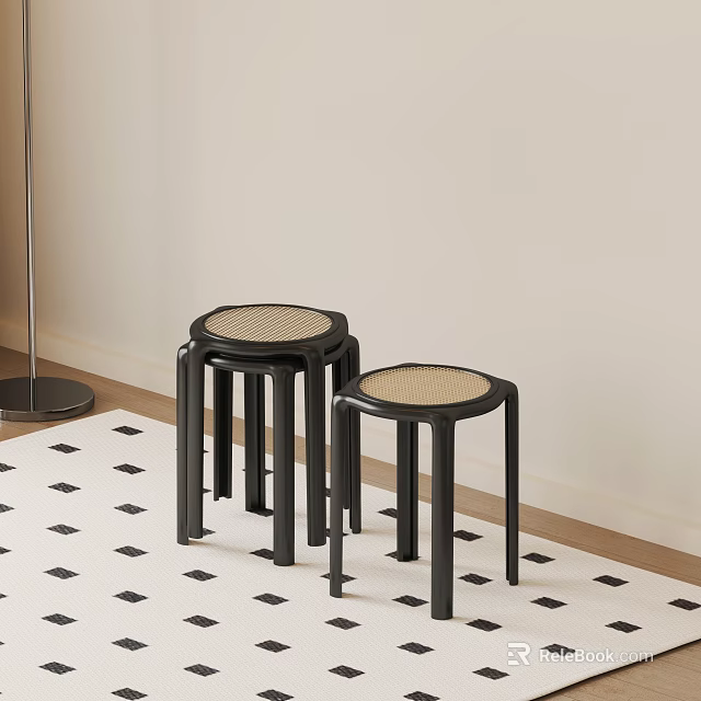 Black Rattan Dining Chairs On Black And White Diamond Pattern Rug With Light Colored Walls 3d model 