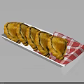 Golden Fried Dumplings Served On White Plate With Red And White Checkered Napkin