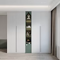 Modern White Wardrobe Interior With Green Accent Shelves And Decorative Ornaments