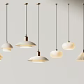Modern Pendant Lights With Various Designs Hanging On Gray Wall Background 3d model