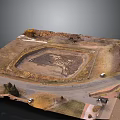 Aerial View Landscape With Circular Dirt Pit Surrounding Road Grassland And Small Buildings