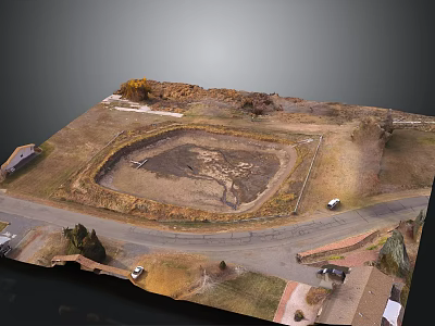 Aerial View Landscape With Circular Dirt Pit Surrounding Road Grassland And Small Buildings 3d model