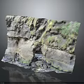 Layered Natural Rock Formation With Green Moss Covered Surface And Small Cave
