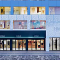 Modern Clothing Storefront With Glass Doors Display Windows And Brand Logos