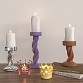 Stylish Spiral Design Candle Holders With Different Colors Lit Candles And Crown Shaped Details