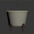 Elegant White Freestanding Bathtub With Brass Faucet And Stylish Brass Feet Design