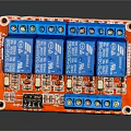 Electronic Relay Module Red Circuit Board With Blue Relays And Terminals