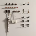 Various Wall Hooks for Hanging Umbrella and Bag on White Wall 3d model