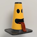 Yellow Cone Decorative Ornament Set With Black Eyes Mouth Red Tongue On Black Base