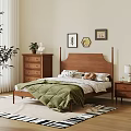 Wooden Double Bed With Green Quilt Pillows Nightstand Decorative Wall Art Area Rug And Plant