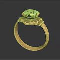 Elegant Gold Ring Featuring Green Gemstone And Intricate Floral Design