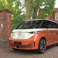 Volkswagen ID Buzz Orange Electric Van Parked Outdoors