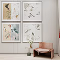 Four Decorative Paintings With Birds And Floral On Beige Wall With Chair And Side Table