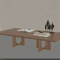 Modern Minimalist Wooden Coffee Table With Circular Legs Open Book Stacked Books And Decor Sculptures