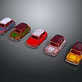 Colorful Vintage Toy Cars with Snow Covered Tops Arranged in a Row
