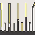 Modern Outdoor Lights Standing In Garden Courtyard With Varied Heights And Designs