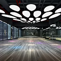 Modern Fitness Gym Interior With Wooden Floor Circular Ceiling Lights And Large Windows