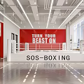 Modern SOS BOXING Exhibition Hall With White Boxing Ring And Red Motivational Backdrop