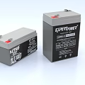 Two Different Branded Lead Acid Batteries In Gray And Black Cases