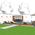 Courtyard Garden with Swimming Pool Wooden Deck Lounge Chairs Green Lawn and White Walls
