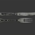 Elegant Silver Carved Cutlery Set With Dinner Fork And Decorative Knife