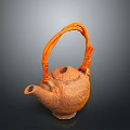 Handcrafted Teapot With Orange Woven Handle And Textured Brown Body