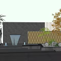 Modern Landscape Feature Wall With Black Stone Water Fountain And Palm Trees