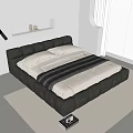Modern Leather Double Bed With White Pillows And Black Blanket In White Bedroom