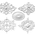 Ornate White Carvings with Intricate Designs and Various Shapes as Decorative Accents
