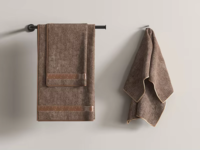 Brown Towels Hanging On Wall In Bathroom 3d model