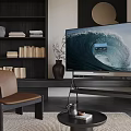 TV Displaying Ocean Wave In Modern Living Room With Brown Leather Chair Dark Wooden Bookshelf