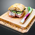 Delicious Fresh Sandwich on Wooden Cutting Board with Green Onions