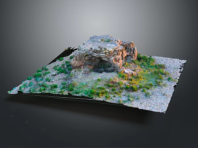 Rocky Terrain Model With Green Vegetation And Textured Ground Surface 3d model